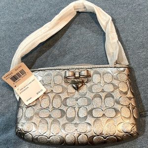 Coach Silver 8” Wristlet Embossed Logo